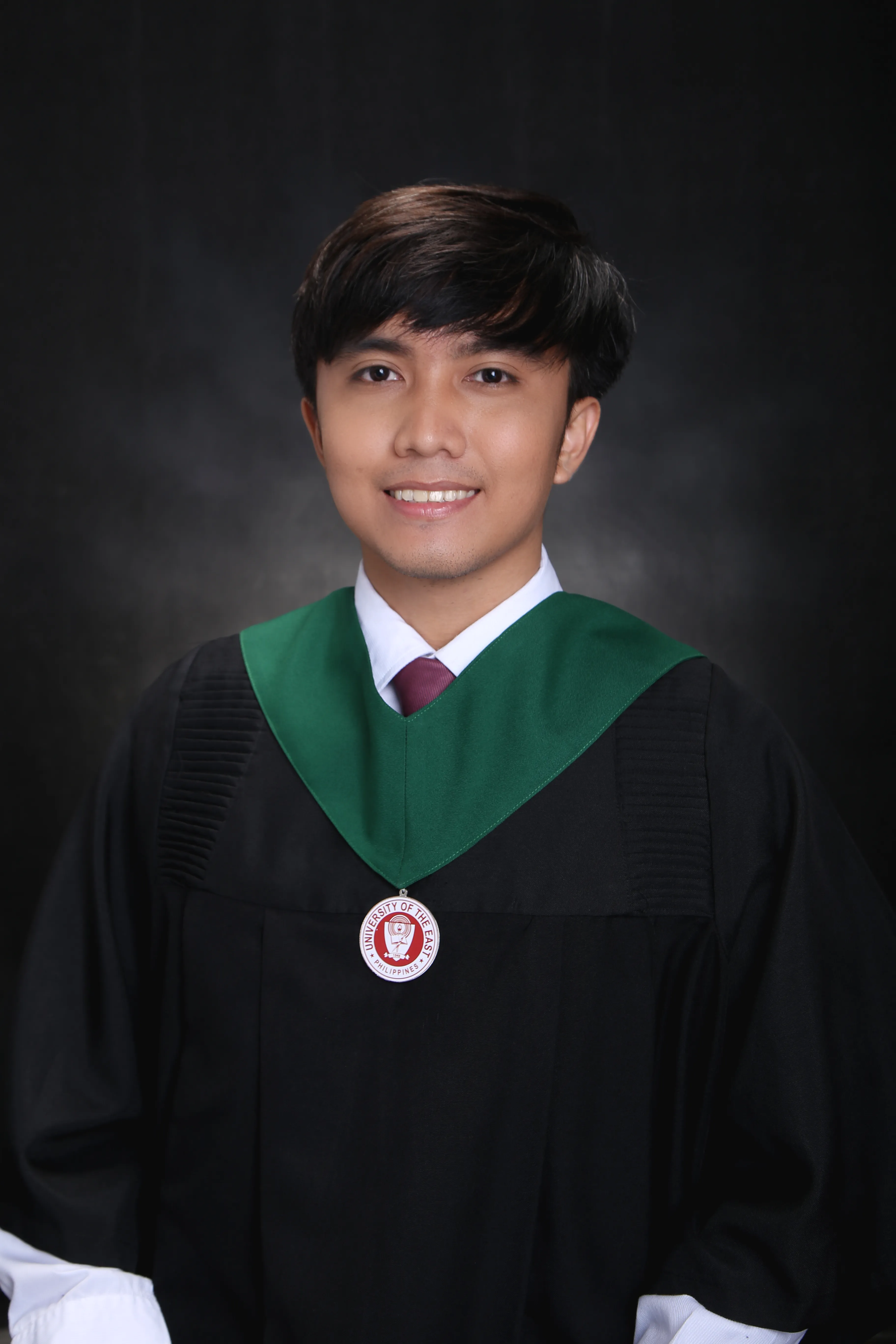 Ivan Delos Santos's graduation picture